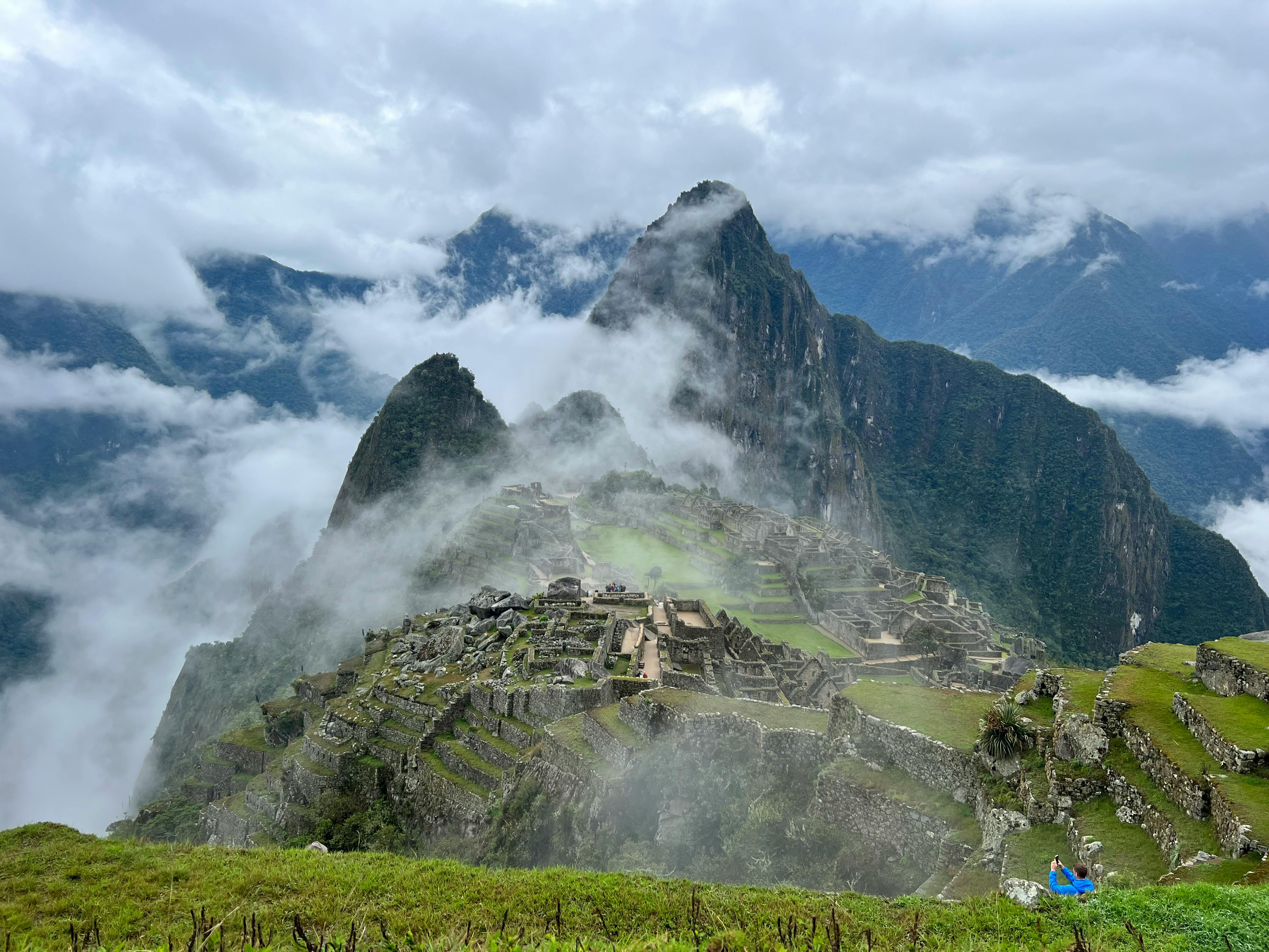 The ancient Inca citadel of Machu Picchu on a foggy morning